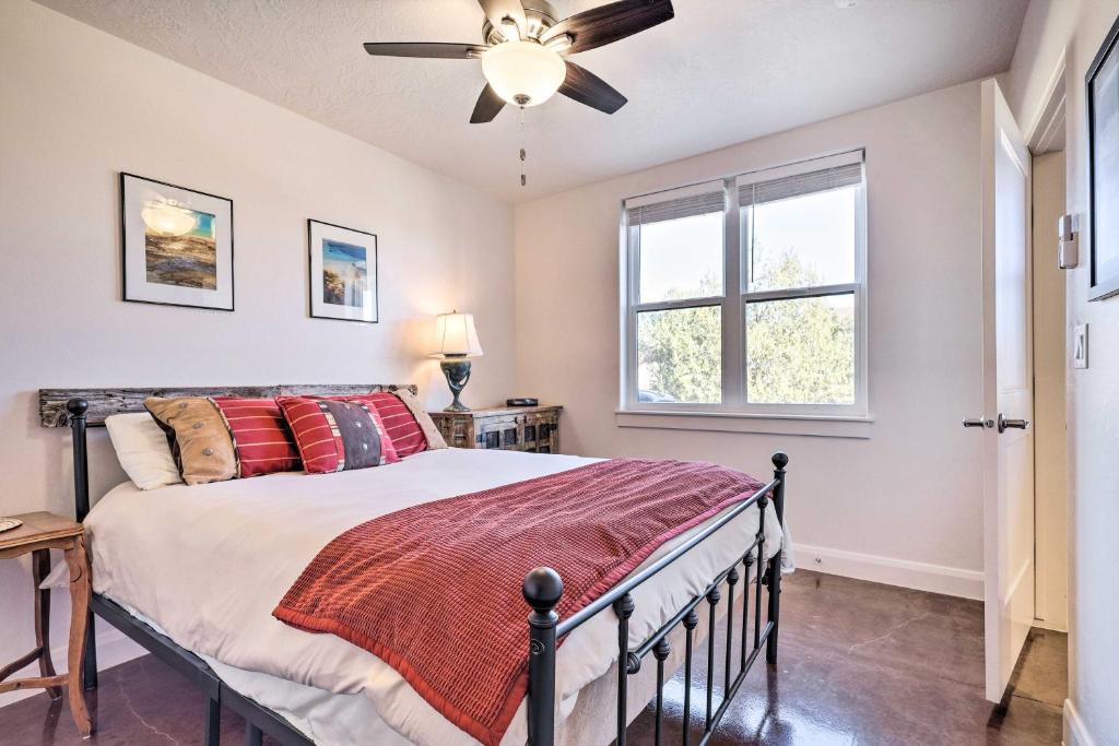 a bedroom with a bed and a ceiling fan at Quaint Kanab Casita - 3 Mi to the Heart of Town! in Kanab