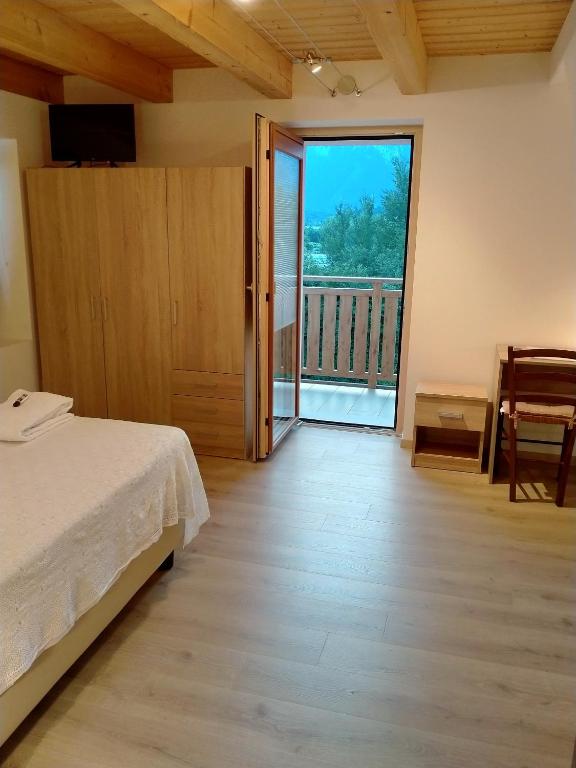 Postel nebo postele na pokoji v ubytování Antico Melo B&B