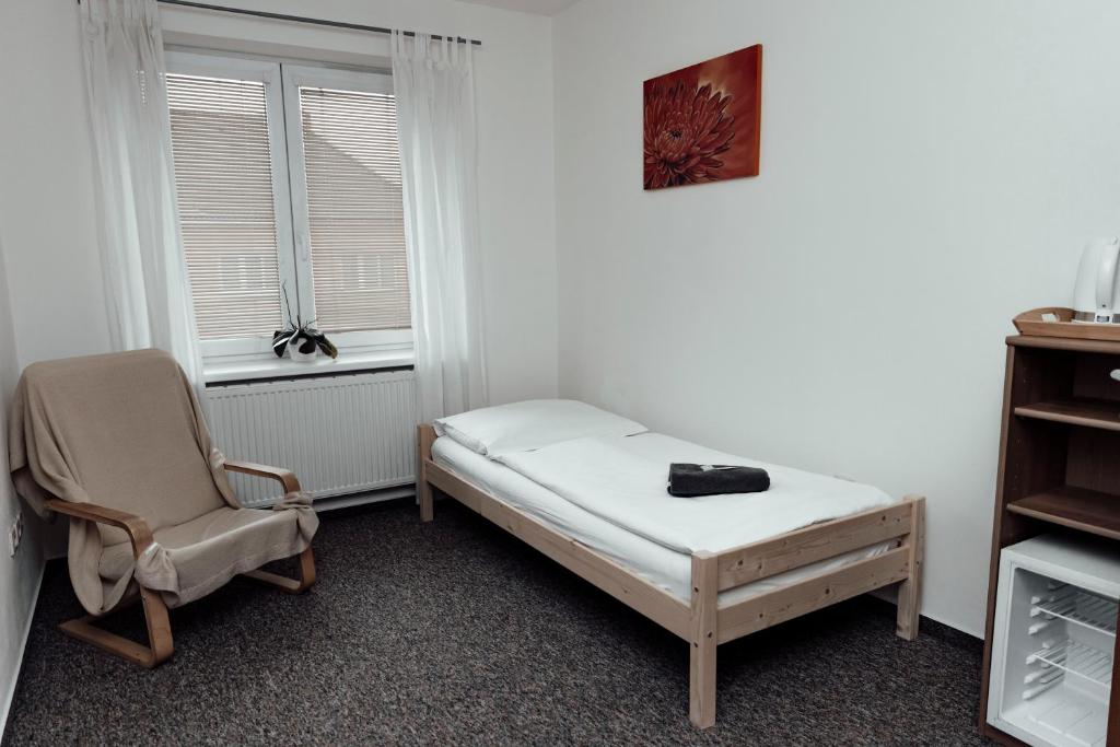 Posteľ alebo postele v izbe v ubytovaní PENZION VERMON