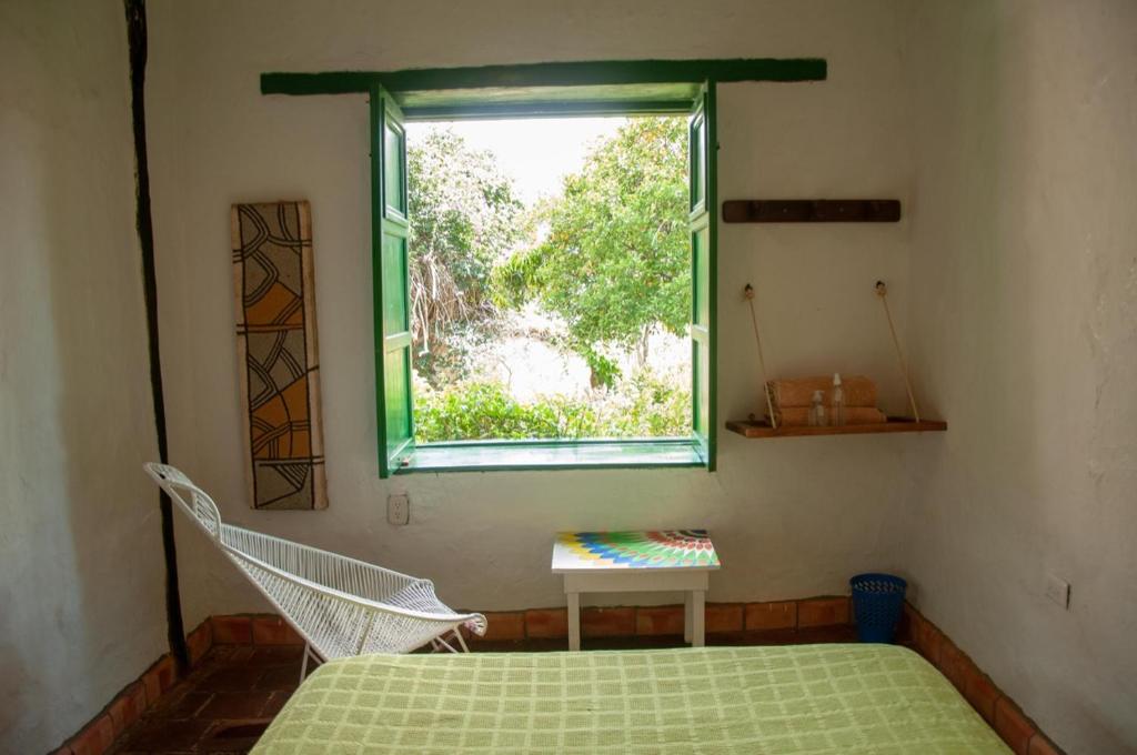 Letto o letti in una camera di Nacuma Garden Hostel - Casa Nacuma