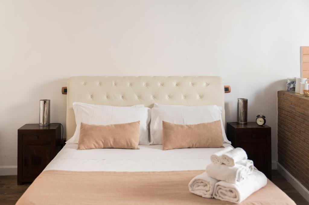 Postel nebo postele na pokoji v ubytování Agora Apartments - Armida
