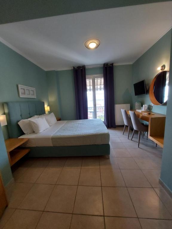 Postel nebo postele na pokoji v ubytování Leto Nuevo Hotel
