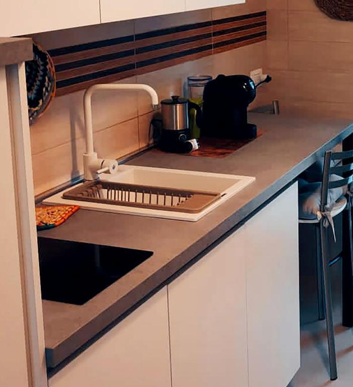 Una cocina o cocineta en Deluxe Alba