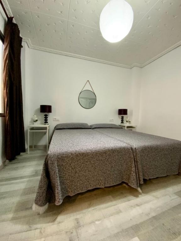 Postel nebo postele na pokoji v ubytování Casa de la playa VT-52170-V