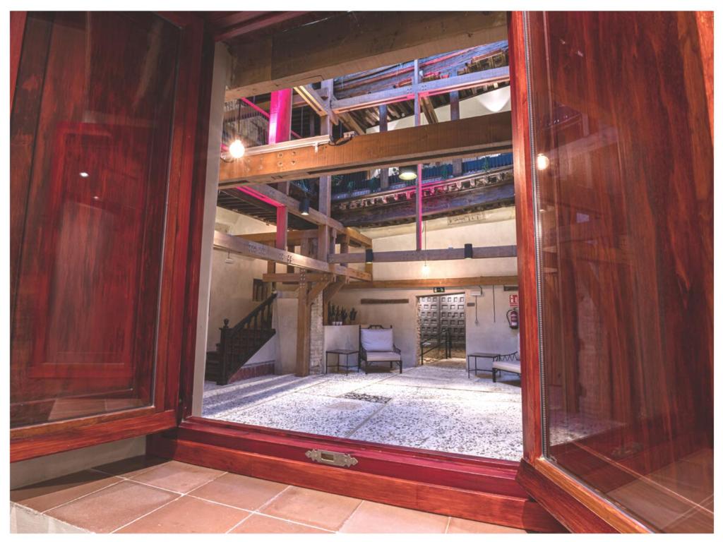 A bed or beds in a room at Casa Palacio Rodrigo de la Fuente by Príncipe David - Seis Apartamentos de Lujo -