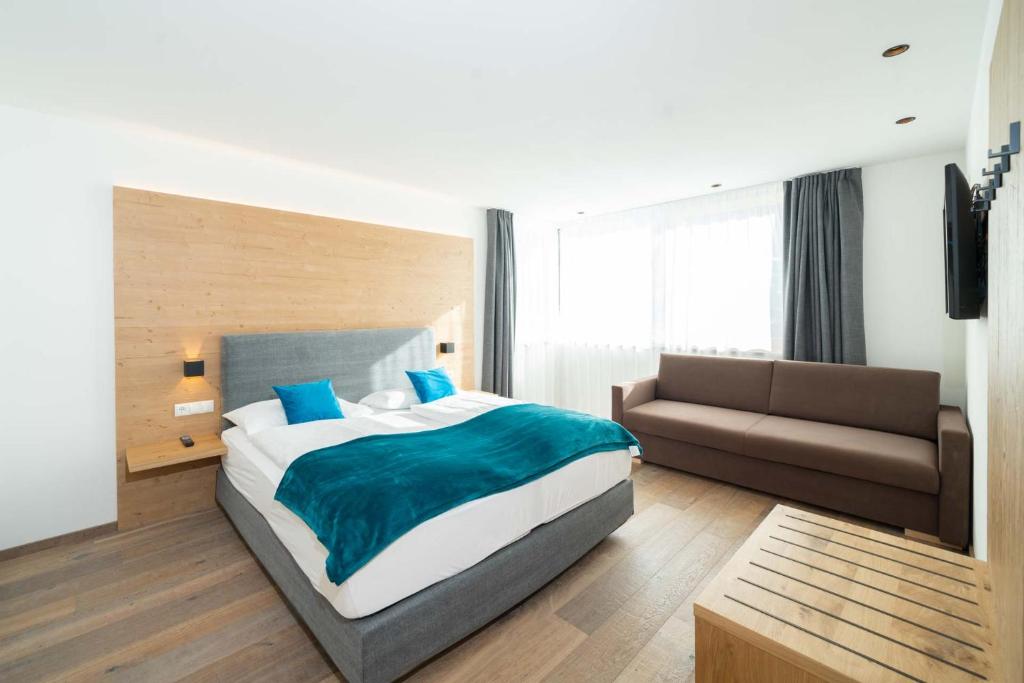 Postel nebo postele na pokoji v ubytování Villa David Dolomites