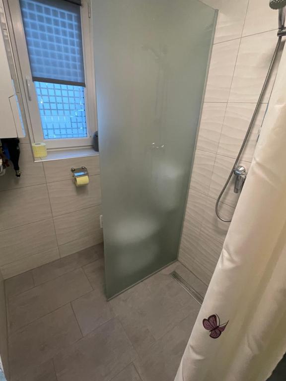Kúpeľňa v ubytovaní Heni Apartment