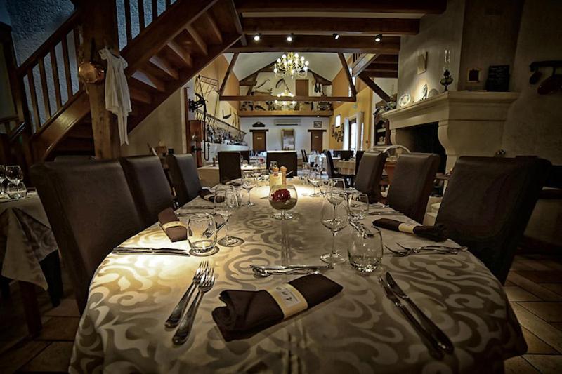 Posezení v ubytování Logis Auberge Des Moissons