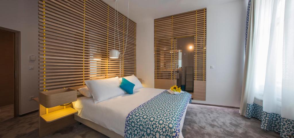 Postel nebo postele na pokoji v ubytování Bed & Atmosphere Rooms