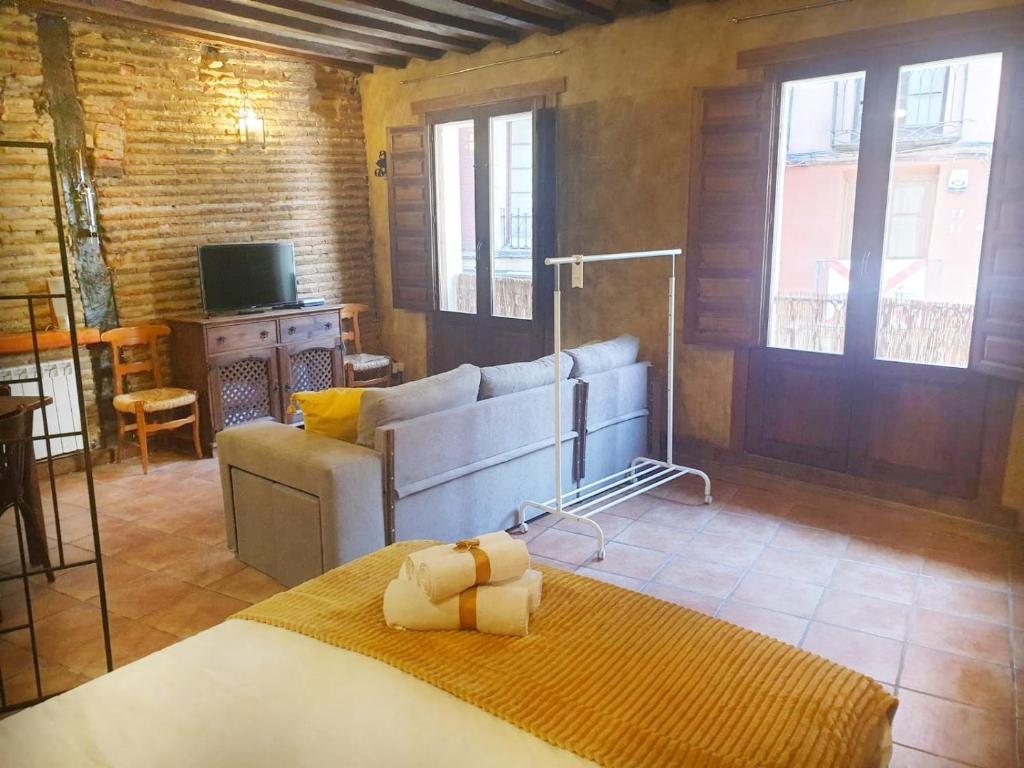 Televízia a/alebo spoločenská miestnosť v ubytovaní El Rincon de Frida by Apartamentos Logrono