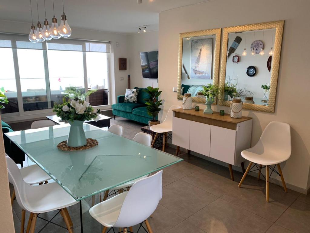 Posezení v ubytování Tantum Concon Apartment