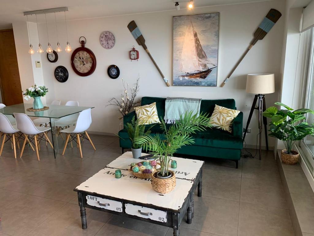 Posezení v ubytování Tantum Concon Apartment