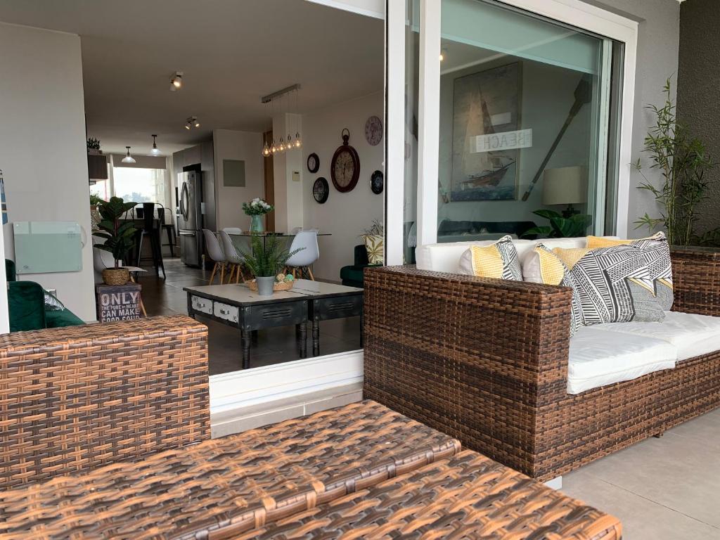 Posezení v ubytování Tantum Concon Apartment