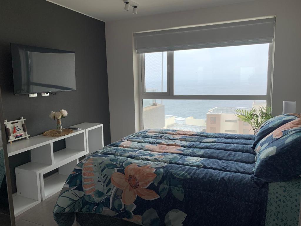 Postel nebo postele na pokoji v ubytování Tantum Concon Apartment