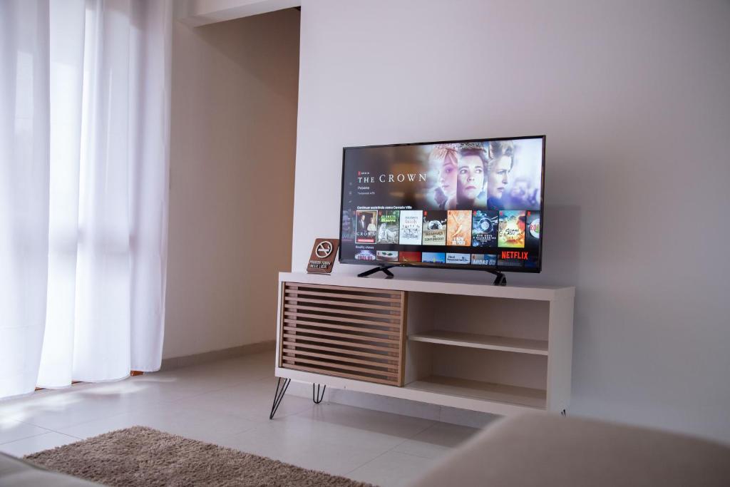 TV a/nebo společenská místnost v ubytování Cerrado Ville