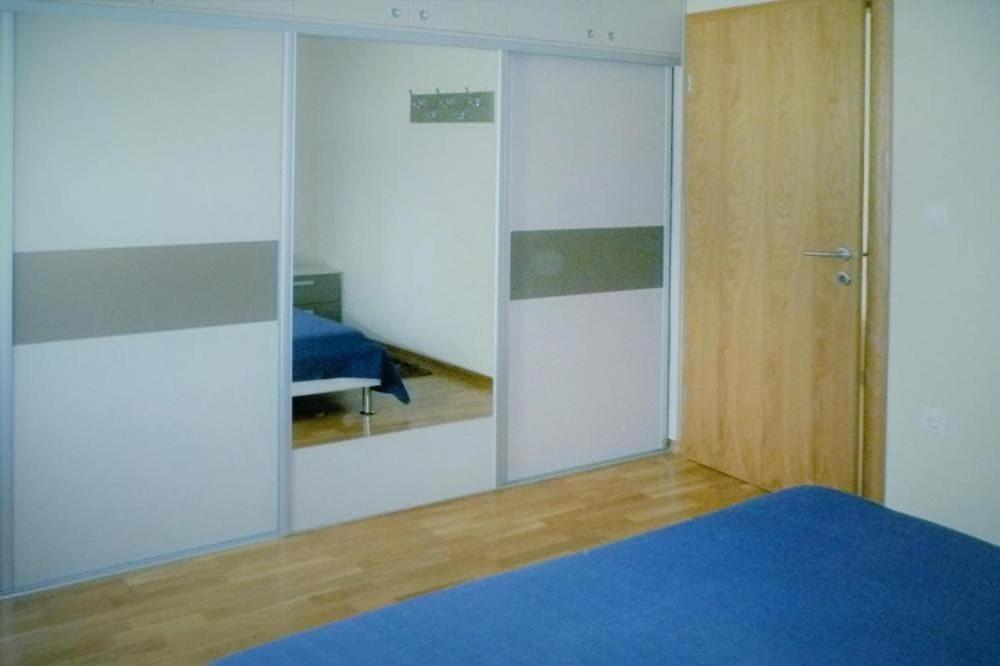 Posteľ alebo postele v izbe v ubytovaní Apartment in Starigrad Paklenica