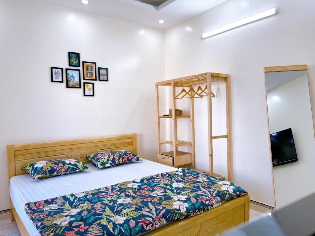Postel nebo postele na pokoji v ubytování Xoài Xanh Hostel & Villa