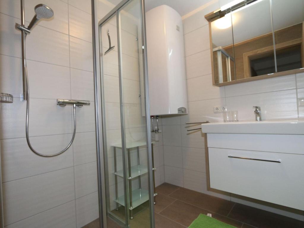 A bathroom at Apartment in Bramberg am Wildkogel with balcony