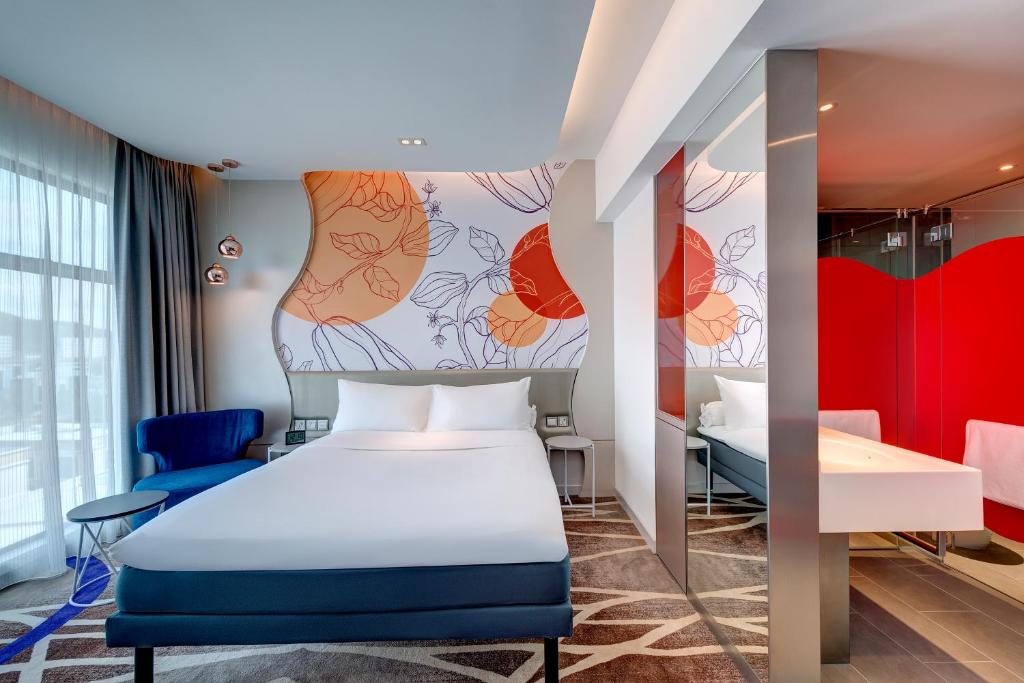 Postel nebo postele na pokoji v ubytování ibis Styles Johor Iskandar Puteri