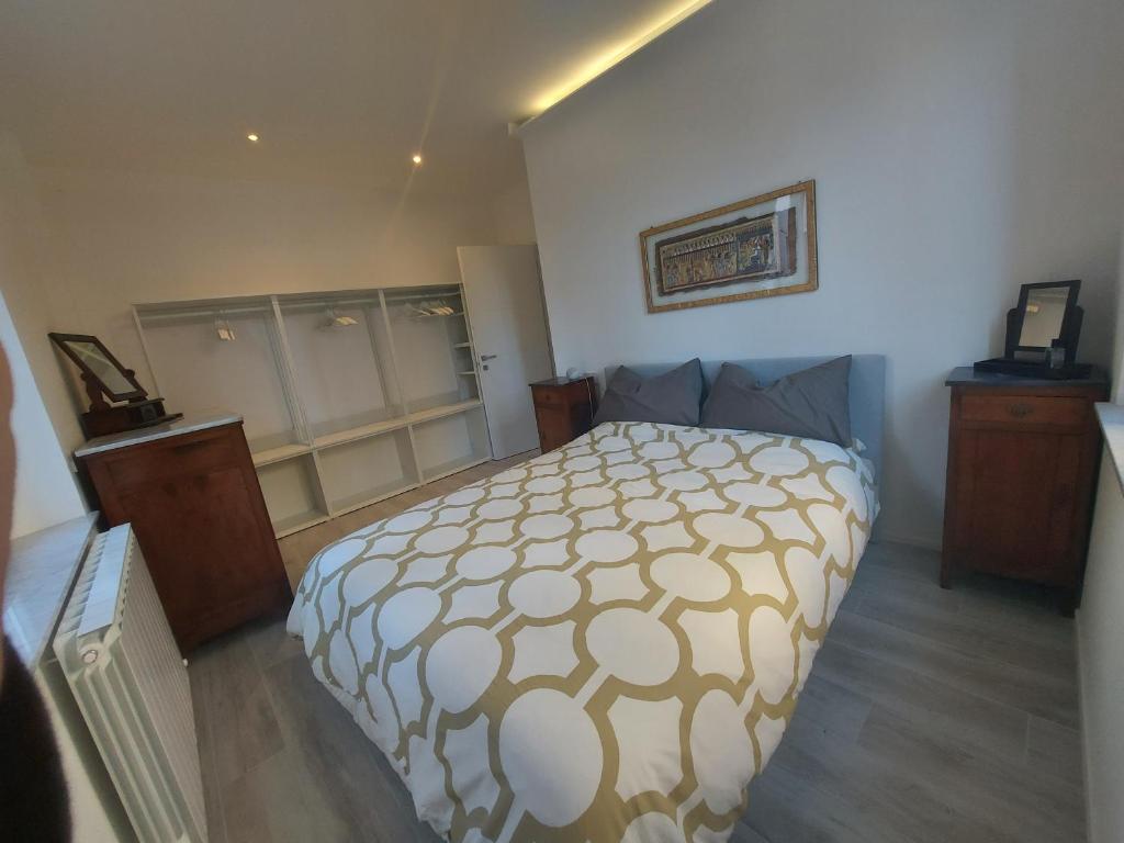 Säng eller sängar i ett rum på Domotica Ancona