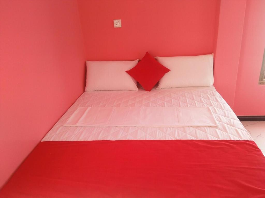 Postel nebo postele na pokoji v ubytování beach life hostal