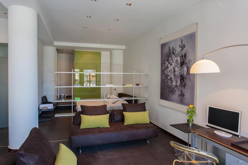 TV a/nebo společenská místnost v ubytování Faro Apartments