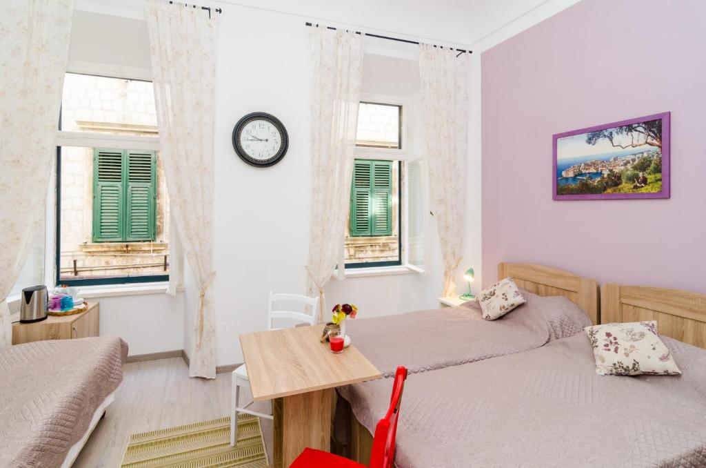 Posteľ alebo postele v izbe v ubytovaní Rooms Tezoro