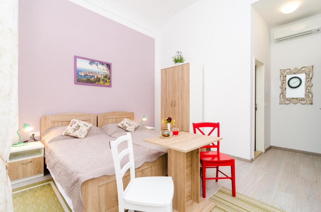 Posteľ alebo postele v izbe v ubytovaní Rooms Tezoro