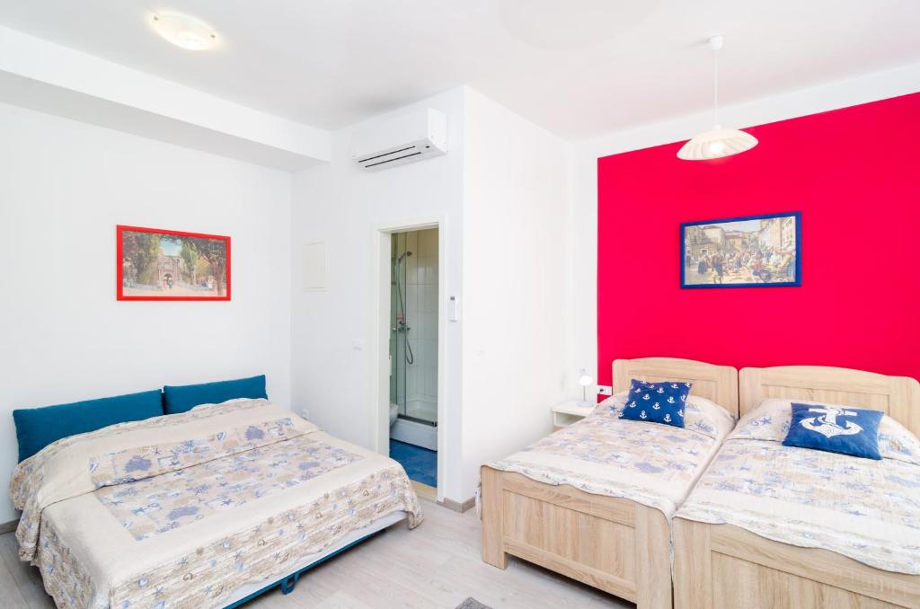 Posteľ alebo postele v izbe v ubytovaní Rooms Tezoro