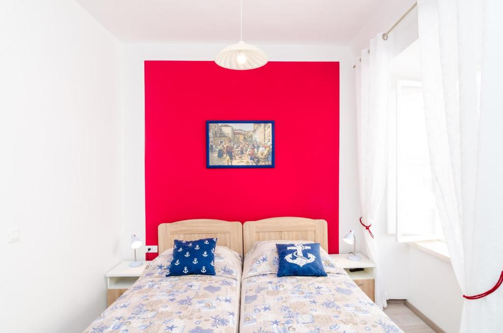Posteľ alebo postele v izbe v ubytovaní Rooms Tezoro