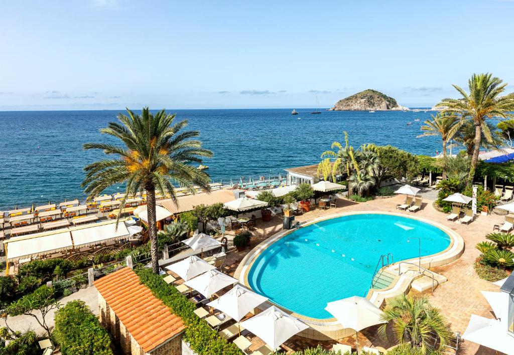 an aerial view of a resort with a swimming pool and the ocean at Hotel Parco Smeraldo Terme in Ischia