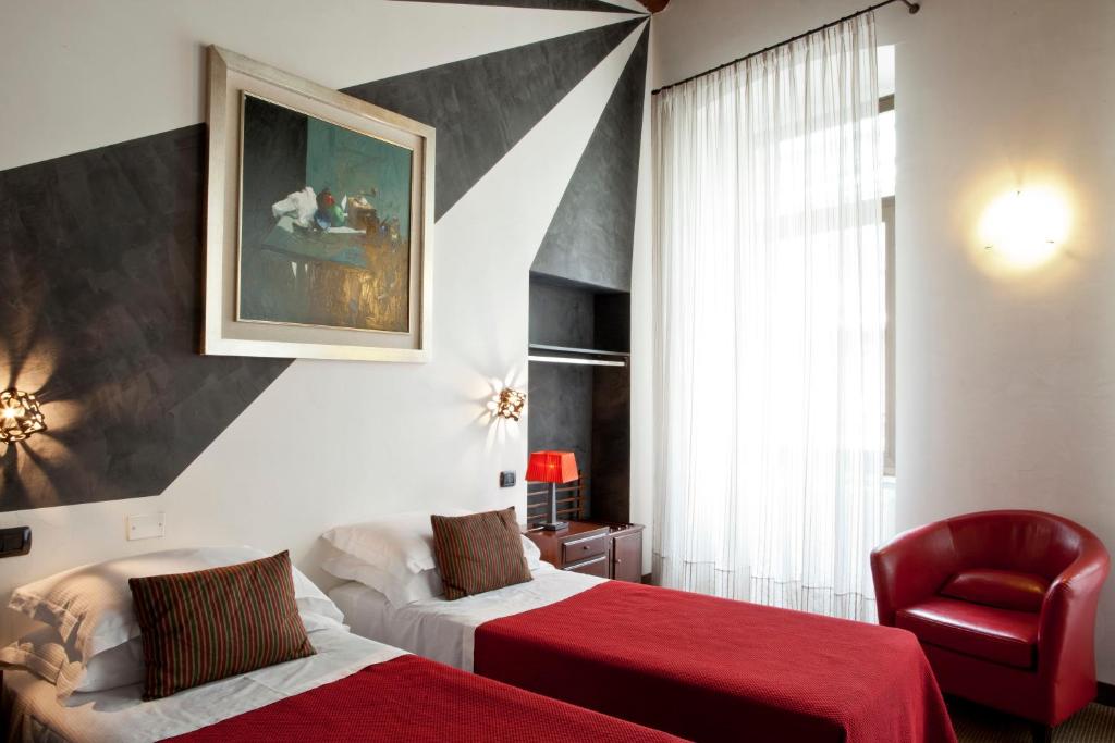 Postel nebo postele na pokoji v ubytování Boutique Hotel Scalzi - Adults Only