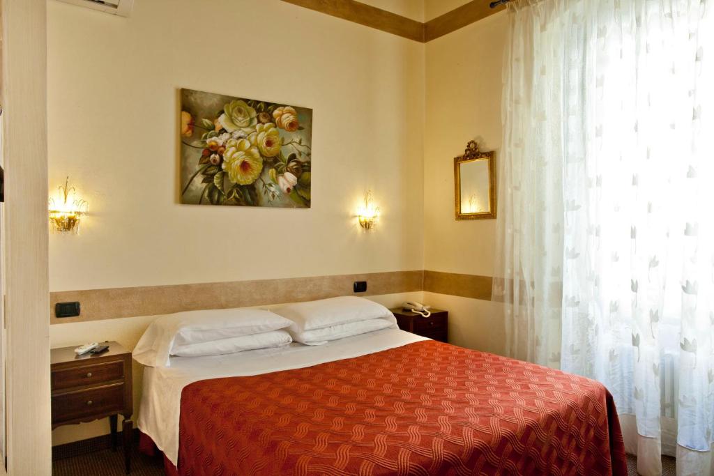 Postel nebo postele na pokoji v ubytování Boutique Hotel Scalzi - Adults Only