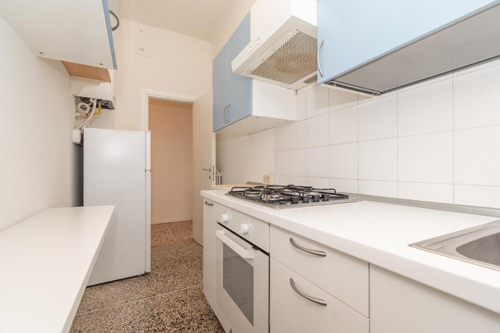 A kitchen or kitchenette at Appartamento Ospedale Civile 3 - F&L Apartment