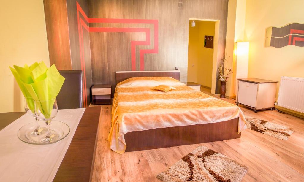 Postel nebo postele na pokoji v ubytování Hotel EOS