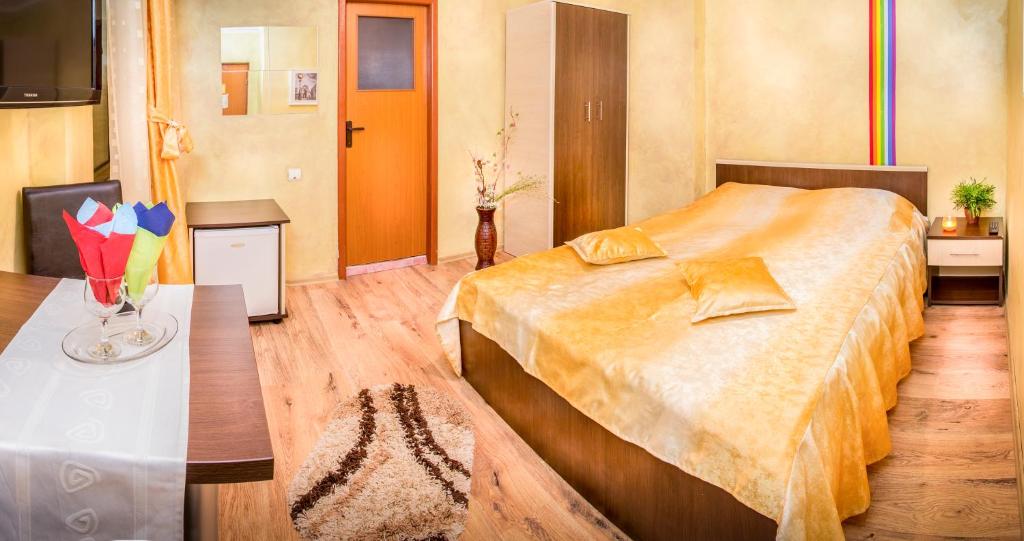 Postel nebo postele na pokoji v ubytování Hotel EOS