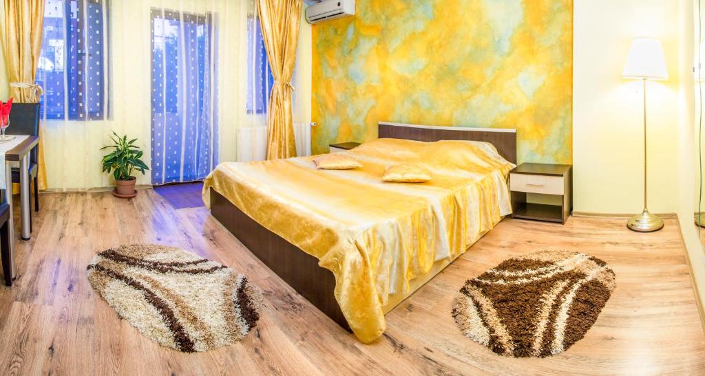 Postel nebo postele na pokoji v ubytování Hotel EOS