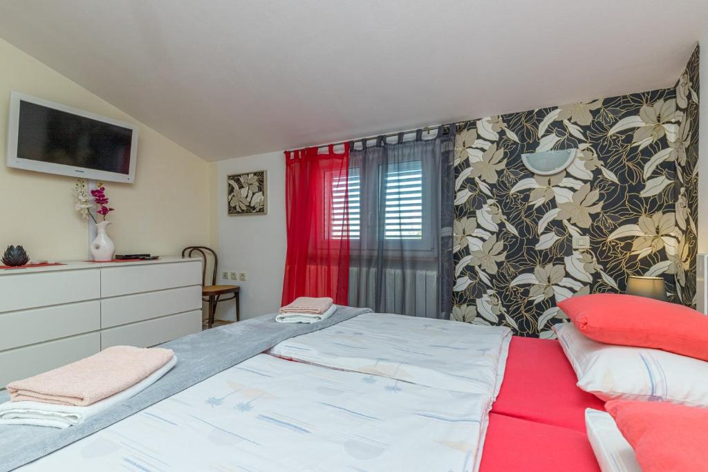 Łóżko lub łóżka w pokoju w obiekcie Apartment Teri