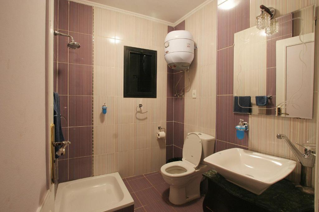 Koupelna v ubytování Arabesque Hotel