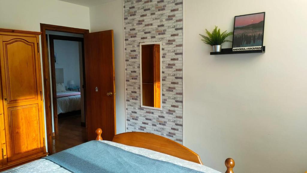 Postel nebo postele na pokoji v ubytování Apartament turistic Pont d’Ordino