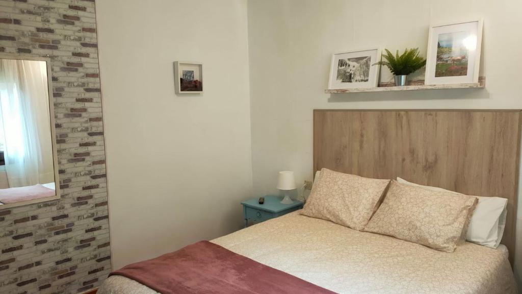 Postel nebo postele na pokoji v ubytování Apartament turistic Pont d’Ordino