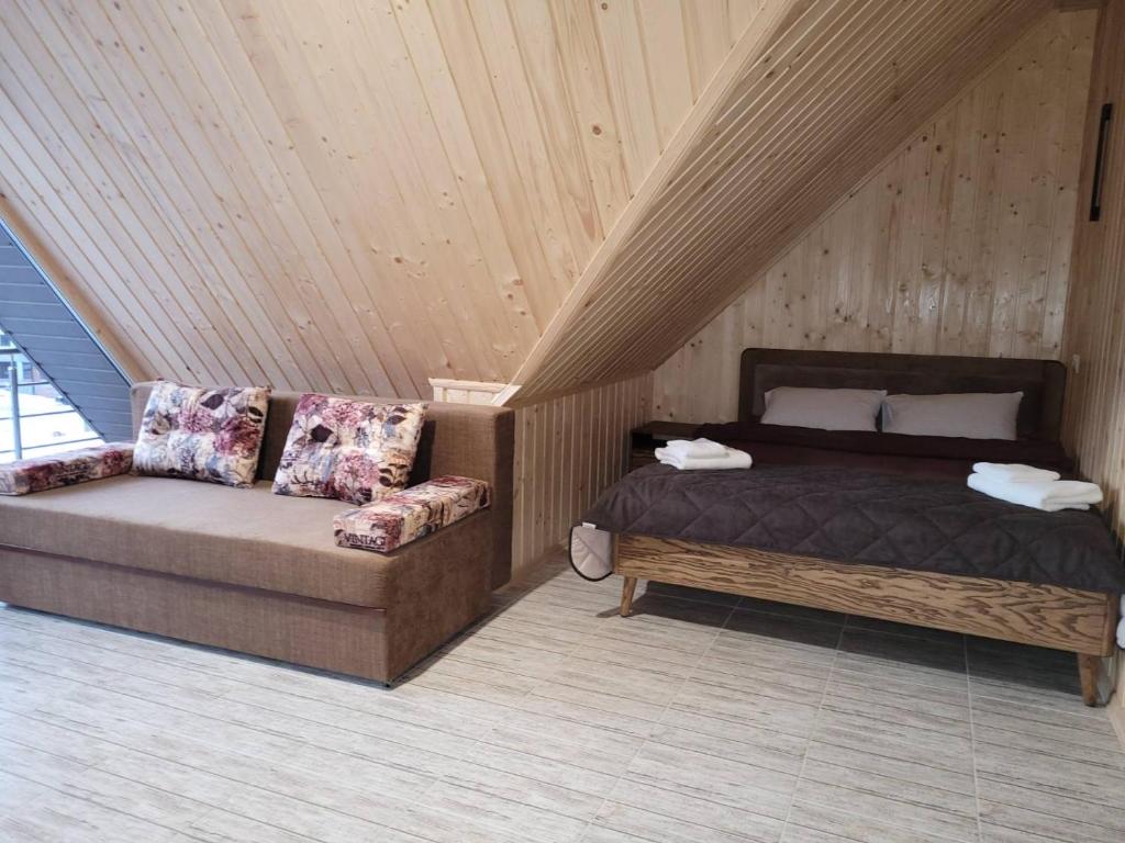 Postel nebo postele na pokoji v ubytování Ніка