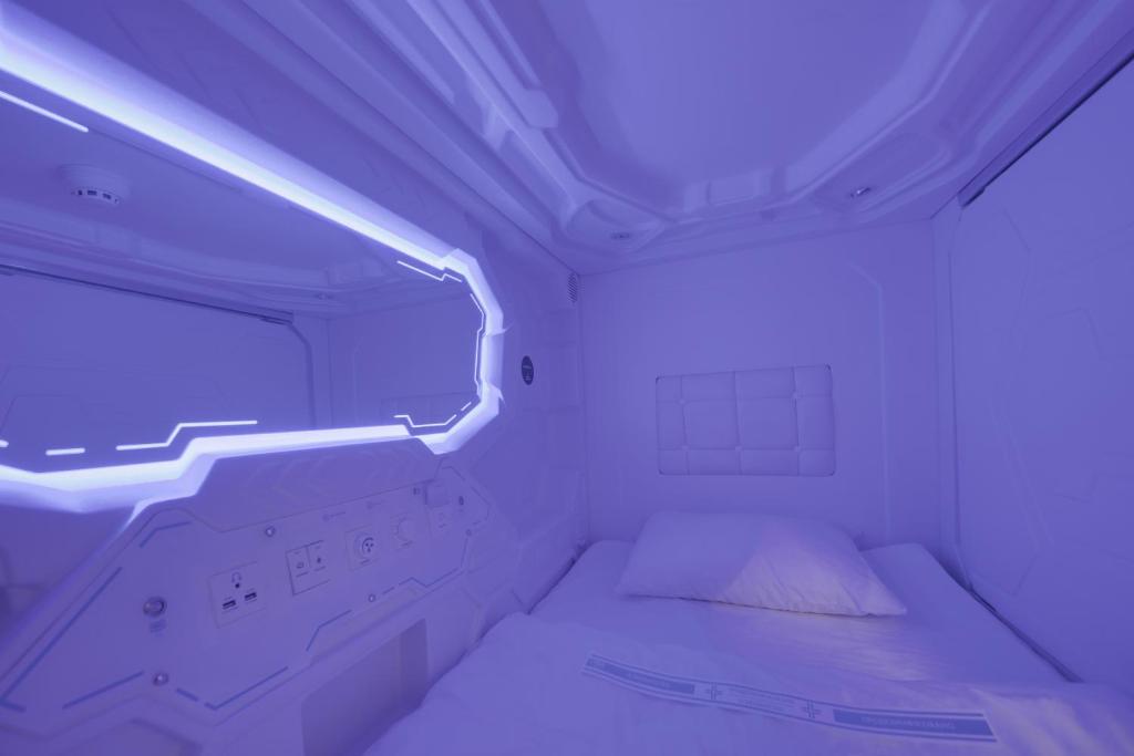 Postel nebo postele na pokoji v ubytování MOONOTEL Maidan