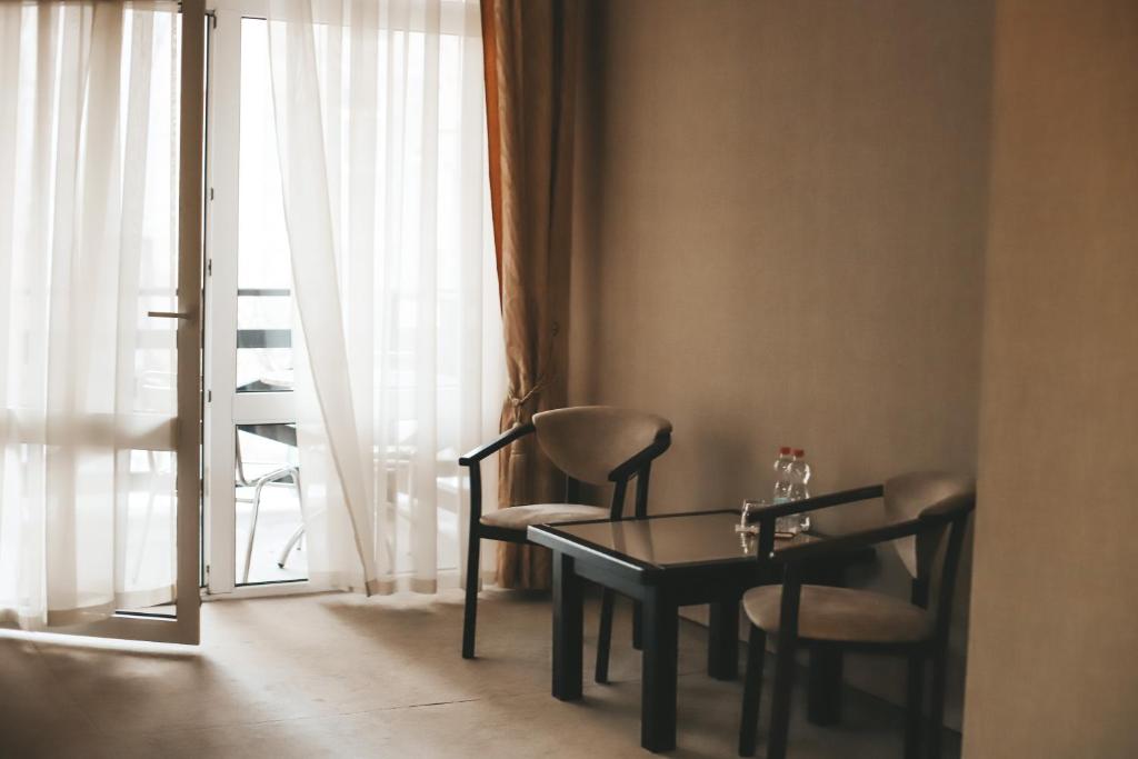 Posezení v ubytování Georg Palace Hotel