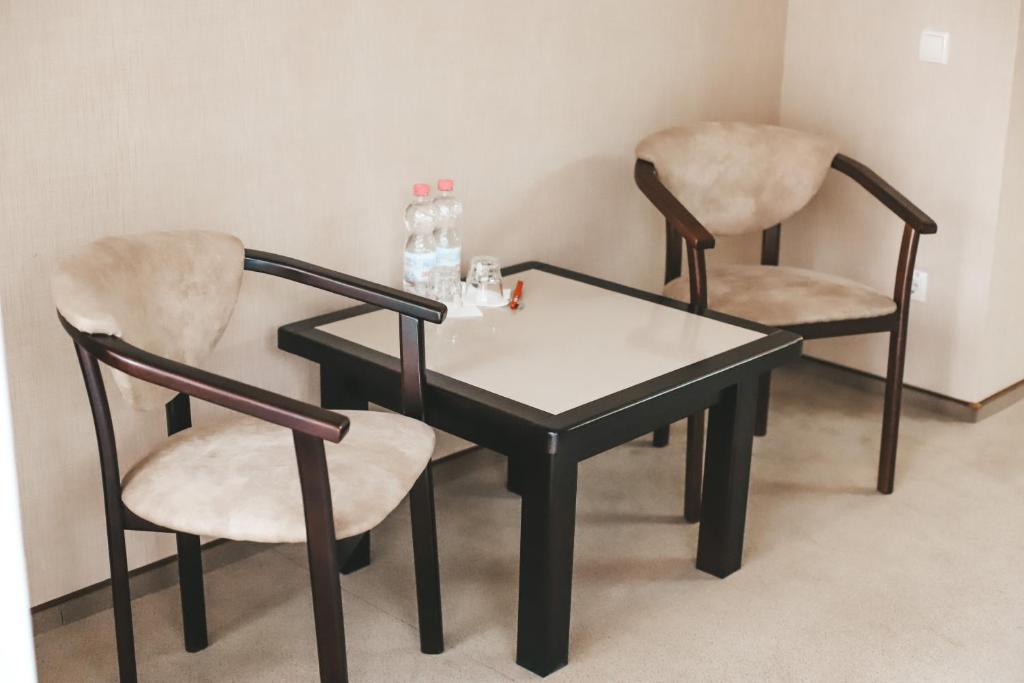 Posezení v ubytování Georg Palace Hotel