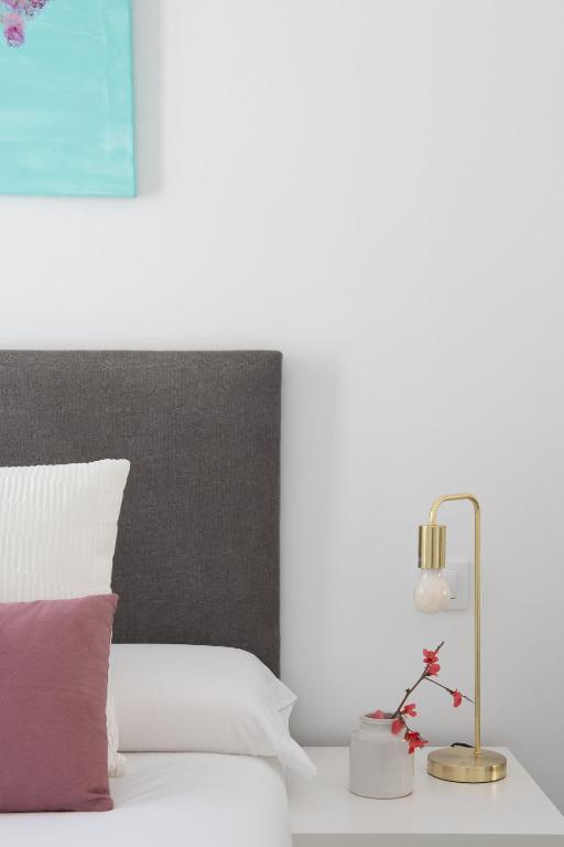Posteľ alebo postele v izbe v ubytovaní Hommyhome Teodosio