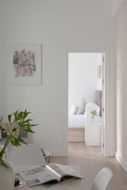 Posteľ alebo postele v izbe v ubytovaní Hommyhome Teodosio