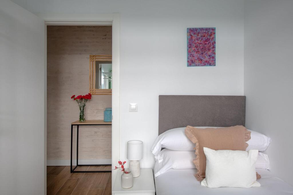 Posteľ alebo postele v izbe v ubytovaní Hommyhome Teodosio