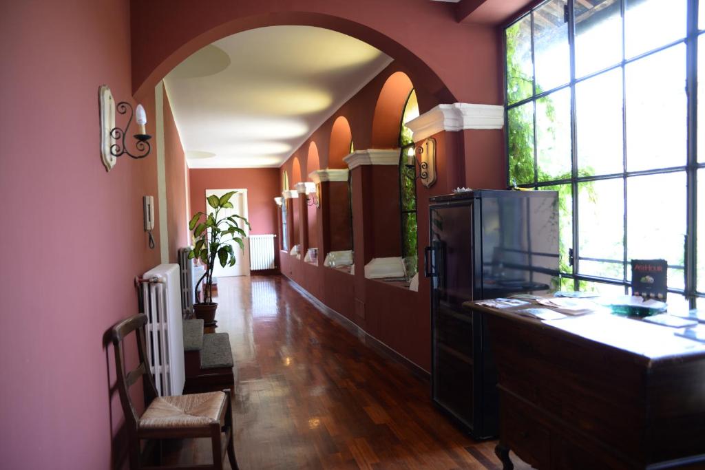 Kuchyň nebo kuchyňský kout v ubytování Villa Chiara Hotel