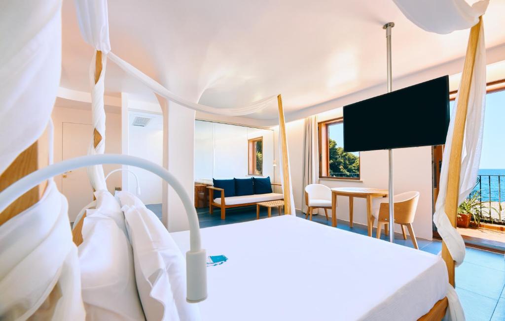 TV a/nebo společenská místnost v ubytování Approdo Resort Thalasso Spa